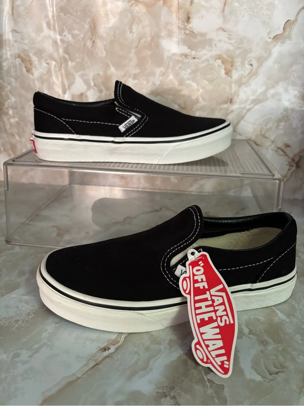Vans Black and White Slip-On Canvas Sneakers